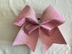 Rhinestone Glitter Cheer Bows, Smothered in Rhinestones. Beautiful under the lights October Pink Cheer Bows, Cheer Pink Out, Cheer Bows Ideas, Pink Cheer Bow, Bling Cheer Bows, Pink Cheer Bows, Cheer Season, Cheer Hair Bows, Glitter Cheer Bow