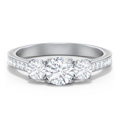 three stone engagement ring with diamonds on the band and side stones set in white gold