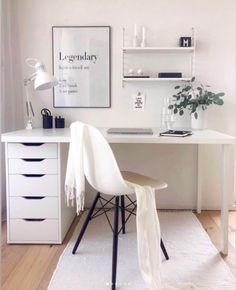 a white desk and chair in a room