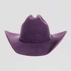 Introducing the Cattleman Womens Felt Cowboy Hat, a true iconic Cattleman-shaped crown with a shovel brim for that Yellowstone Dutton Ranch Hat look. Offered by American Hat Makers means that you can rest easy because it is backed by our 50 years of experience and Lifetime Guarantee. Featuring a sewn-in sweatband with a unique hidden pull strap tightening system for a one of a kind fit! Plus we’ll include two adhesive size reducers for an even more custom experience. Brim 4" Crown 4 3/4" Midweig Colored Felt Cowboy Hats, Purple Cowboy Hat, Tropical Goth, Ranch Hat, Lane Frost, Yellowstone Dutton Ranch, Felt Cowboy Hat, American Hat Makers, American Hat