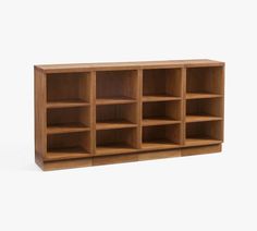 an empty wooden shelf with several compartments