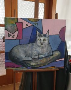 a painting of a cat sitting on top of a table