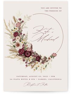 an elegant wedding card with flowers and leaves on the front, in pinks and purples