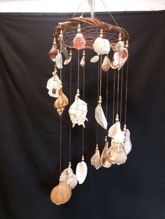 a mobile with shells hanging from it's sides