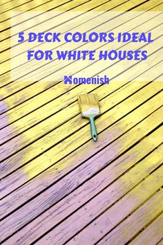 a wooden deck with a paint brush on it and the words, 5 peck colors ideal for white houses