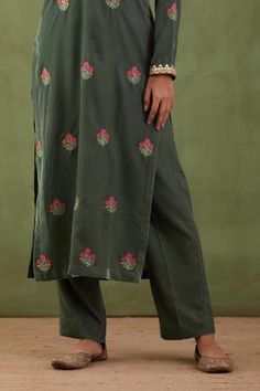 Falak green silk velvet kurta with floral embroidered motifs. Paired with pant and banarasi striped dupatta.
Component: 3
Pattern: Embroidered
Type Of Work: Floral
Neckline: Notched
Sleeve Type: Long Sleeves
Fabric: Mashru, Silk Velvet
Color: Green
Other Details: 
Floral motifs
Striped dupatta
Occasion: Destination Wedding, Puja - Aza Fashions Velvet Kurta, Kurta Set For Women, Embroidered Motifs, Velvet Color, Kurta Set, Green Silk, Silk Velvet, Floral Motifs, Set For Women