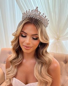 female model wearing tall bridal crown with round crystal peaks and halos Simple Quince Hairstyles With Crown, Wedding Hairstyles Half Up Half Down With Crown, Curled Hair With Crown, Birthday Hairstyles With Tiara, Wedding Hair Down Tiara, Quince Hairstyles Front View, Pageant Hair Middle Part, Bride Crown Hairstyle, Hair Crown Hairstyles