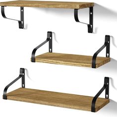 three wooden shelves with black metal brackets