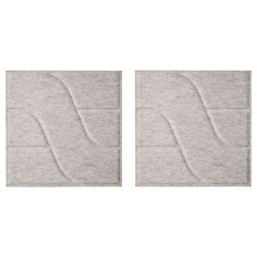 two pieces of paper with wavy lines on them, one in grey and the other in white