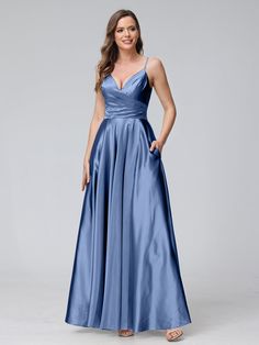 Lavetir sells a large selection of 2025 new bridesmaid dresses and wedding party dresses online. Stay on top of the latest fashion trends with these bridesmaid dresses featuring oversized bows, airy tulle skirts, sexy corset styles, and dramatic pleated metallics. Comes in various styles, such as A-line, mermaid, sheath, and empire waist, to suit different body types and preferences. Here is the dress detail: Fabric: Silk Satin; Silhouette: A-Line/Princess; Neckline: Spaghetti Straps; V-Neck; He Steel Blue Satin Bridesmaid Dresses, Blue Satin Prom Dress, Steel Blue Bridesmaid Dresses, Corset Styles, Dresses With Pockets, Tulle Skirts, Party Dresses Online, Satin Bridesmaid Dresses, Blue Bridesmaid Dresses