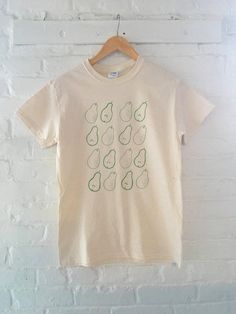 Hand Printed and Hand Drawn!This is a 100% cotton screen printed t shirt with a hand drawn illustration the inside and outside of pears.  It's perfect for fall!  The shirt shown here is Natural and printed in green ink. // PROCESS:  All of our items are individually hand printed by either me or my dad, which can lead to slight variations in placement.  The ink is heat cured and will not fade over time.  Since our items are printed to order, there is a 1-2 week processing time before shipping.  I Organic Short Sleeve T-shirt With Screen Print, Hand Printed Organic Cotton T-shirt, Hand Printed Relaxed Fit Organic Cotton T-shirt, Hand Printed Organic Cotton T-shirt, Relaxed Fit, Hand Printed Organic Cotton T-shirt In Relaxed Fit, Eco-friendly Graphic Cotton T-shirt, Eco-friendly Short Sleeve Cotton T-shirt, Eco-friendly Graphic Tee In Cotton, Eco-friendly Cotton Graphic T-shirt