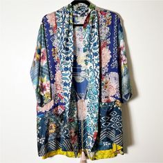 Johnny Was 100% Silk Blue Floral Patchwork Print Kimono With Pockets And Beaded Tie Tassel Front In Excellent Condition, No Flaws Size S Small - Open Front Should Be One Size Fits All, Could Easily Fit Large Range Of Sizes. Dry Clean Material: 100% Silk Pit To Pit Measurement: 21 1/2" Across Shoulder To Pit Measurement: 10" Length: 30" Inventory # 2594 Beaded Tie, Floral Patchwork, Patchwork Print, Print Kimonos, Johnny Was, One Size Fits All, Blue Floral, Blue Yellow, The 100