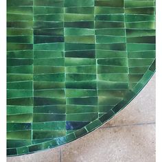 a table with green tiles on it