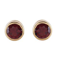 Bathed in 22k gold with a high-polish finish sterling silver frames two stones of faceted garnet. Alok Jain presents this sparkling pair of stud earrings crafted by local artisans. Gold Faceted Ruby Earrings, Formal Gold Bezel Set Earrings, Gold Garnet Jewelry With Bezel Setting, Classic Ruby Birthstone Earrings, Formal Ruby Birthstone Earrings, Gold Earrings With Ruby Birthstone, Gold Faceted Garnet Earrings, Gold Garnet Faceted Earrings, Faceted Garnet Earrings In Gold