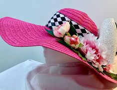 Hot pink wide brim straw summer hat all decked out in Kentucky Derby colors!  I used a black and white jockey ribbon adorned with big white bows and lots of pretty pink peonies!  Fun hat screams Derby, goes with many outfits!  ( mans boutinere available too) Pink Summer Hats For Kentucky Derby, Pink Straw Hat For Kentucky Derby And Beach, Pink Straw Hat For Kentucky Derby Beach Outing, Pink Summer Hat For Kentucky Derby, Pink Summer Sun Hat For Kentucky Derby, Pink Brimmed Straw Hat For Spring, Wide Brim Pink Straw Hat For Kentucky Derby, Pink Wide Brim Straw Hat For Kentucky Derby, Pink Straw Hat With Short Brim For Spring