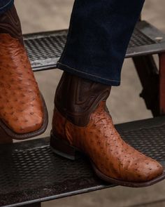 Our broad square toe boot in full-quill ostrich stuns. Features a two-tone shaft and vamp, double stitched welt, 1 ½” straight heel, and a 12” shaft with a new Tecovas original cording pattern. It’s a classic square toe boot in our most popular exotic hide. The Emmitt is made for special occasions with an edge that is pure cowboy. DETAILS 1 ½” straight heelBroad square toe12” shaftTwo-tone shaft and vampLeather outsoleGoodyear welt construction *RUNS TRUE TO SIZE Tecovas Boots Mens, Tecovas Boots, Square Toed Boots, Boots Outfit Men, Western Boots For Men, Ostrich Boots, Western Style Boots, Roper Boots, Xmas List