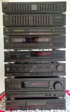 a stack of stereos sitting on top of each other