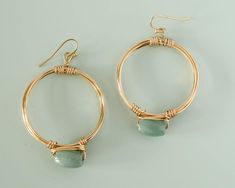 "Simple hoop gemstone earrings It makes a great everyday earrings. Or, if you are thinking of getting a thoughtful gift for your bridesmaids, this earrings is it! They can wear it during your wedding and also after that. Definitely a bridesmaid gift that will be appreciated and enjoyed for a long long time. Measure Length:1 1/2\" long **Important: Unless otherwise noted, all of the findings (ear wires, chains, etc.), framed gems, and charms in the jewelry is plated. Plated findings have a brass Modern Wire Wrapped Dangle Hoop Earrings, Modern Gemstone Hoop Earrings For Gift, Modern Gemstone Hoop Earrings As Gift, Modern Handmade Wrap Earrings For Gift, Wire Wrapped Dangle Hoop Earrings As Gift, Modern Wire Wrapped Hoop Earrings For Gift, Modern Gemstone Hoop Earrings For Everyday, Modern Adjustable Wrap Earrings As Gift, Everyday Small Hoop Wire Wrapped Earrings