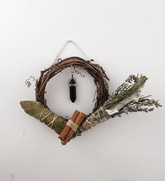 a bunch of dried herbs sitting on top of a wreath