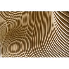 an abstract wooden wall with wavy lines in the center and bottom, as if it were carved from wood or plywood