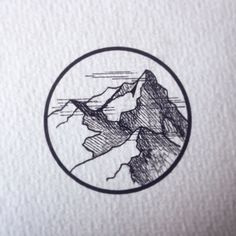 a black and white drawing of mountains in a circle