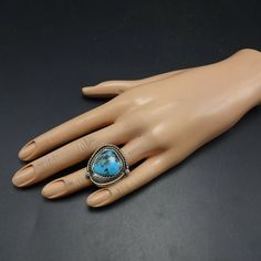 "VINTAGE NAVAJO RING DESCRIPTION: With a breathtaking specimen of blue Morenci turquoise, this ring will be a treasured addition to your collection of fine vintage Native American jewelry. MEASUREMENTS: Ring face measures 1 1/8\" x 1 1/8\" Cabochon measures 18mm x 17mm RING SIZE: 6 1/4 WEIGHT: 13.8 grams SIGNED: no STERLING: unmarked, verified sterling silver" Bohemian Turquoise Ring With Gemstone, Bohemian Blue Turquoise Ring With Gemstone, Bohemian Blue Turquoise Gemstone Ring, Bohemian Blue Turquoise Ring, Southwestern Blue Turquoise Ring With Natural Stones, Southwestern Style Blue Turquoise Ring With Natural Stones, Southwestern Style Blue Round Ring, Western Style Turquoise Gemstone Rings, Southwestern Blue Open Ring Jewelry