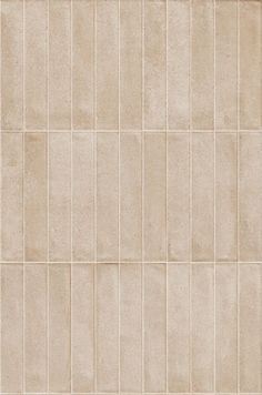 a beige tile wall that is very clean and ready to be used as a background