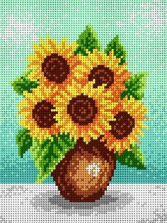 a vase filled with sunflowers on top of a table