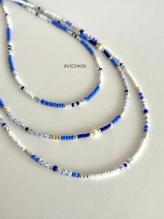 "Dainty Blue beaded necklaces with fresh water pearles and gorgeous royal blue beads in \"old money\" style.   Made with delicate high quality Czech glass seed beads. Get for yourself or gift to a friend. ♥   #vichkin #vichkindesign ↠ ABOUT    ▢  Size: about 15 inch, goes up to about 17 inch with chain extension.  ▢  Materials: 2mm / 3mm quality Czech glass seed beads  ▢  This item is handmade and may vary slightly from the picture, making every one completely unique.  ▢  Ready to ship. ↠ IMPORTANT The product is not suitable for young children. Please exercise child  Please check out my Jewelry Collection here: https://www.etsy.com/ca/shop/Vichkin?ref=seller-platform-mcnav§ion_id=22731346 Back to main page https://www.etsy.com/ca/shop/Vichkin All my items are handmade with love ♥  Natalie Cheap Blue Necklace For Vacation, Cheap Oval Beads Necklaces For Beach, Cheap Blue Necklaces For The Beach, Cheap Silver Beaded Jewelry For The Beach, Affordable Blue Summer Necklaces, Cheap Glass Beaded Necklaces For Beach, Cheap Beaded Chain Necklace For Vacation, Affordable Beaded Chain Necklace For Beach, Cheap Blue Necklaces For Beach