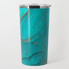 a blue and gold marbled metal travel mug