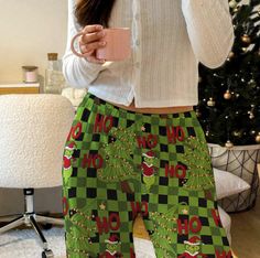 🎄🧸Celebrate the holiday season in style with our Grinch Christmas-themed striped pajama bottoms. Made from 100% brushed polyester, these pajama bottoms offer a cozy, luxurious feel that's perfect for lounging or relaxing at home. The soft, stretchy fabric drapes comfortably, while the festive stripes come to life in vivid detail and color. They make a great gift for loved ones or yourself, adding a festive touch to your Christmas season. Features: 100% brushed polyester for a soft, cozy feel L Christmas Loungewear Pants, Casual Christmas Holiday Bottoms, Casual Christmas Loungewear Bottoms, Casual Christmas Holiday Pants, Casual Holiday Pants For Christmas, Christmas Pajama Pants, Cozy Pants, Striped Pyjamas, Grinch Christmas