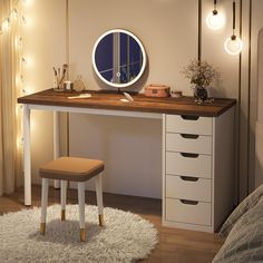 a desk with a mirror, stool and lights on the wall in a small room