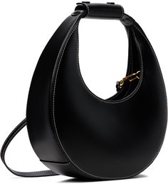 Structured buffed leather shoulder bag in black. · Press-stud tab at integrated carry handle · Adjustable and detachable crossbody strap · Magnetic tab at open throat · Zip pocket at interior · Suede lining · Contrast stitching in white · H5 x W9 x D3 · Total height: H11 Supplier color: Black Staud Formal Bags With Top Carry Handle, Staud Formal Bag With Top Carry Handle, Staud Leather Evening Shoulder Bag, Staud Leather Shoulder Bag For Evening, Black Staud Leather Shoulder Bag, Modern Staud Satchel Shoulder Bag, Elegant Black Staud Bags, Staud Leather Shoulder Bag With Round Handle, Staud Leather Bags With Round Handle