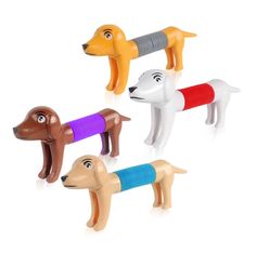 four toy dogs with different colors on them