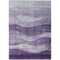 a purple rug with waves on it