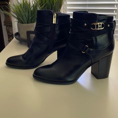 Tommy Hilfiger Black Leather W/Straps Across Front Of Boot.Size 10m,Side Zippers,3.5” Heel, Gold Accessories, Worn Twice, Heel Was Too High For Me Due To Screws In Feet. Hilfiger Shoes, Tommy Hilfiger Shoes, Gold Accessories, Side Zipper, Shoes Women Heels, Tommy Hilfiger, Shoes Heels, Black Leather, Size 10