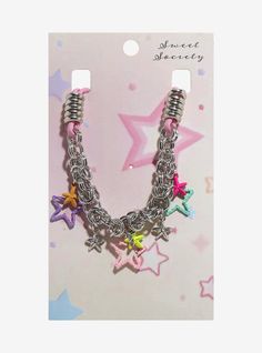 Look like a total star with this eclectic necklace on! It features pink cord and silver-tone hardware detailing  with multicolor star charms and silver-tone stars strung throughout.15" + 3" extenderNickel-free alloy; cordImported Trendy Metal Charm Necklace With Star Charm, Trendy Nickel-free Pink Charm Necklace, Adjustable Pink Dangle Charm Necklaces, Trendy Pink Jewelry With Star Charm, Multicolor Star-shaped Jewelry With Starfish Charm, Nickel Free Pink Metal Charm Necklaces, Pink Nickel-free Metal Charm Necklaces, Trendy Adjustable Star Charm Necklace, Adjustable Trendy Star Charm Necklace