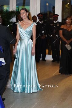 Kate Middleton in this elegant ice blue satin evening formal dress attended a reception in the Bahamas. Featuring plunging neck ruched top with winged shoulder straps, A-line floor length skirt. shown color: ice blue with build-in-bra with boning back zipper closure fully lined Formal Light Blue V-neck Evening Dress, Elegant Light Blue V-neck Evening Dress, Light Blue Evening Dress For Prom, Light Blue Formal Evening Dress For Prom, Light Blue V-neck Evening Gown, Elegant Light Blue Satin Evening Dress, Formal Light Blue Evening Dress With Sweep Train, Elegant Light Blue Formal Evening Dress, Light Blue Elegant Evening Dress For Formal Occasions