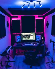 a recording studio with sound equipment and lights