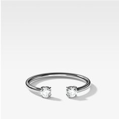 Our Claw series features an assortment of rings using four micro prongs and a little basket to hold each stone. Similar to the diamond-focus style of a shared prong band, the tiny prongs add vintage flair without distracting from your stones. 2 diamonds 2.5mm wide Timeless Diamond Ring With Prong Setting And Open Band, Timeless Sterling Silver Stackable Rings With Prong Setting, Diamond Stackable Rings With Prong Setting, White Gold Stackable Rings With Prong Setting For Promise, Timeless Stackable Open Rings With Prong Setting, Bezel Set Diamond Earrings, Knife Edge Ring, Space Ring, Diamond Cuff Ring