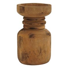 a small wooden vase sitting on top of a table