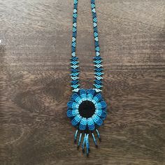 Amazing Brand New From Mexico Blue Artisan Jewelry With Colorful Beads, Artisan Blue Jewelry With Colorful Beads, Light Blue Beaded Flower Jewelry, Light Blue Flower-shaped Beaded Jewelry, Blue Beaded Flower Jewelry, Adjustable Blue Flower Pendant Necklace, Blue Adjustable Flower Necklace For Gift, Adjustable Blue Flower Necklace For A Gift, Blue Flower-shaped Beaded Jewelry