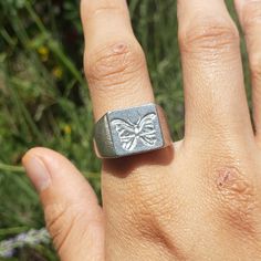 This signet ring is cast in lead-free pewter. The ring size when cast is 7.25. The sealing image is a blue morpho butterfly. could be any color morpho depending on the wax used This is part of a series of signet rings I am making cast from lead-free pewter. Each master ring is hand sculpted to give a unique, rustic style, multi-dimensional relief image when used as a stamp to seal, with sealing wax. Bug Wings, Butterfly Morpho, Pewter Ring, Bday List, Blue Morpho Butterfly, Morpho Butterfly, Blue Morpho, Wax Carving, Signet Ring Men