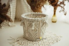 a crocheted basket sitting on top of a table