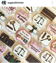 decorated cookies are arranged in the shape of law and justice