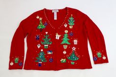 Woman's  X  Large sized Christmas Sweater. Great for your next Holiday or Ugly Christmas Sweater Party.  Zipper front. Size:  Measures 23" across the front from armpit to armpit and           23" from collar base to the bottom edge (center back) of the sweater.  This high quality "Tiara International"  sweater has 6 creatively decorated trees, surrounded by gifts and ornaments.   It is embellished with sequins, beads, jewels, gold metallic thread, embroidery, and appliqué.  On the back: 1 fabulous Christmas tree.   So festive! Sweater Stock #1373 Decorated Trees, Christmas Sweater Party, Xmas Trees, Fabulous Christmas, Ugly Christmas Sweater Party, Womens Sweaters, Thread Embroidery, Metallic Thread, Xmas Tree