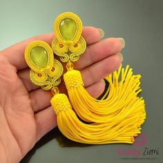 Colorful party earrings, yellow tassel earrings, long yellow earrings, deep yellow earrings, yellow earrings for bride, earrings for gift  FAST SHIPPING - order is delivered to you by COURIER  SHIPMENT  (phone number required)! I created these ethnic, yellow Soutache earrings with tassels, which I called 'YELLOW TASSEL ORKID' without a pattern - this makes it OOAK. They were made for women who like nature, boho-chic and appreciate unusual and clear combination of gems and the set of yellow Soutache cords.  These extravagant earrings would also make an EXCELLENT GIFT FOR HER: Valentine's, Birtday, Christmas, Symphaty or Wedding, etc. OTHER TASSEL EARRINGS IN MY STORE: https://www.etsy.com/shop/OzdobyZiemi?ref=l2-shopheader-name§ion_id=19894239 ITEM DETAILS: *MATERIALS: glass crystal in the Elegant Handmade Yellow Earrings, Yellow Dangle Tassel Earrings Gift, Yellow Tassel Earrings As Gift, Handmade Yellow Earrings For Party, Yellow Dangle Tassel Earrings For Party, Elegant Yellow Dangle Tassel Earrings, Elegant Yellow Tassel Earrings For Gift, Elegant Yellow Tassel Earrings, Yellow Tassel Drop Earrings For Party