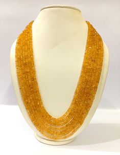 7 Strand Citrine Beads Necklace, Natural Citrine Gemstone Beads Necklace, AAA Citrine Rondelle Faceted Necklace, Citrine Beaded Jewelry Necklace Gemstone :- Citrine Size :- 4-5mm Approx. Shape :- Rondelle Faceted Necklace Strand :- 7 Strand Necklace Color :- Same as Picture Quality :- AAA GRADE https://www.etsy.com/in-en/shop/LatestBeadsJewellery?ref=simple-shop-header-name&listing_id=720939504 Your Feedback is very Important for us. If you have any problem regarding packaging or product, kindly Luxury Gold Beaded Necklace For Celebration, Orange Faceted Oval Beads, Orange Faceted Beads, Yellow Gemstone Beads For Jewelry Making, Orange Gemstone Beads For Jewelry Making, Orange Beaded Necklace With Faceted Beads, Amber Citrine Beaded Necklace, Yellow Gemstone Beaded Necklaces With Round Beads, Citrine Gemstone Beads For Jewelry Making