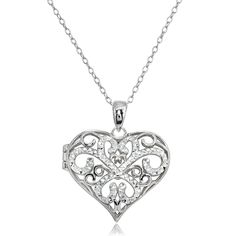 This beautiful locket necklace that holds pictures of your loved ones showcases a stunning heart-shape diamond-cut filigree design. The necklace is crafted of .925 sterling silver and is nickel free. This locket pendant hangs from a 18 inch rolo chain and is secured by a spring-ring clasp. This necklace is the perfect gift and can be purchased as locket necklaces for women and locket necklaces for girls. Product Details Metal Type sterling-silver Metal Stamp 925-sterling Weight 4.3GR Length 18IN Necklaces For Girls, Locket Necklaces, Picture Locket, 14k Yellow Gold Necklace, Heart Locket Necklace, Heart Shaped Diamond, Filigree Design, Holiday Jewelry, Girls Necklaces