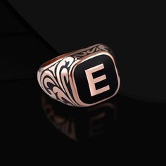 Sterling Silver Rose Plated Enamel Alphabet Letter Symbol Seal Ring, Mens initial Ring initial Signet Ring, Mens Customizable Letter Rings This 925 Sterling Silver Enamel Alphabet Letter Symbol Minimalist Ring is photographed with the original and each item has handmade processing details. It is very elegant and stylish for daily use, giving a classy look to your outfits. Product Code: FRSGR109 Product Name: Alphabet Symbol Ring Metal: Handmade 925 Sterling Silver (Can also be produced in 14/18/22 carat gold upon request. Weight: 16 - 17 gram ● Letter Rings For Man  ● Mens Alphabet Ring  ● Letter Signet Ring  ● Unique Mens Ring  ● Mens Enamel Ring  ● Mens Jewelry  ● Silver Rings For Man  ● Gift For Him 🎁 Gift Box 🎁  🎁 Free Shipping - DHL & FedEx - UPS  🎁 Free Express Shipping - This Ha Mens Initial Ring, Stackable Name Rings, Letter Rings, Ring Initial, Gold Initial Ring, Alphabet Symbols, Mens Pinky Ring, Unique Mens Rings, Mens Silver Jewelry